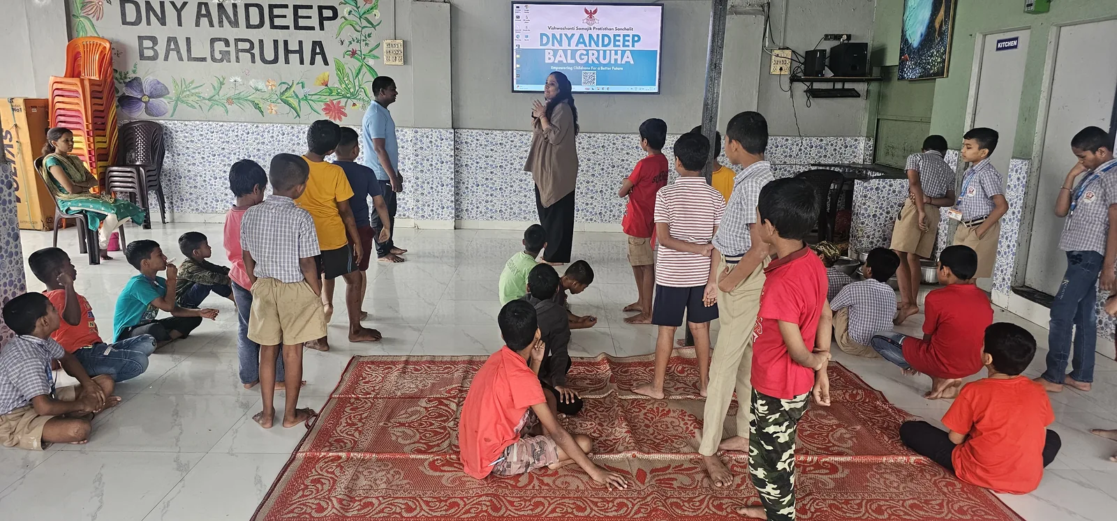 Children taking part in a movement activity at the Dnyandeep Balgruha centre